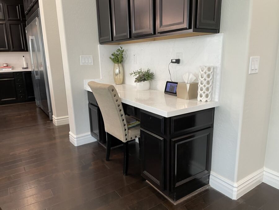 Built-in desk nook with espresso cabinetry in a Chandler kitchen remodel