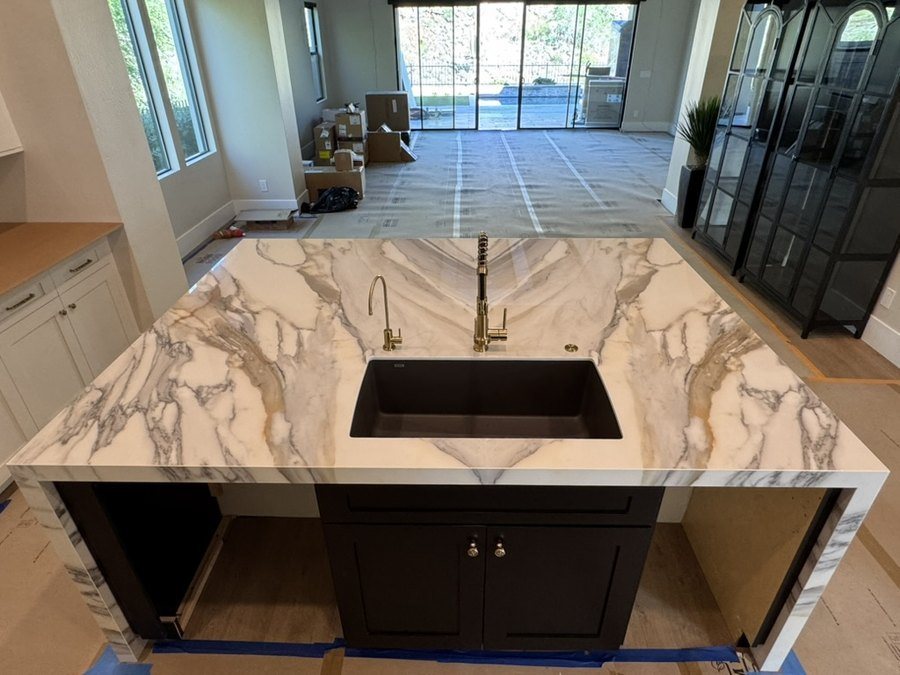 Bookmatched porcelain waterfall island with an undermount sink, Fountain Hills, AZ