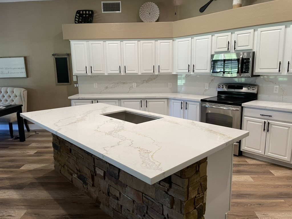 Kitchen island with stacked-stone base and vein-matched quartz countertop, Queen Creek, AZ
